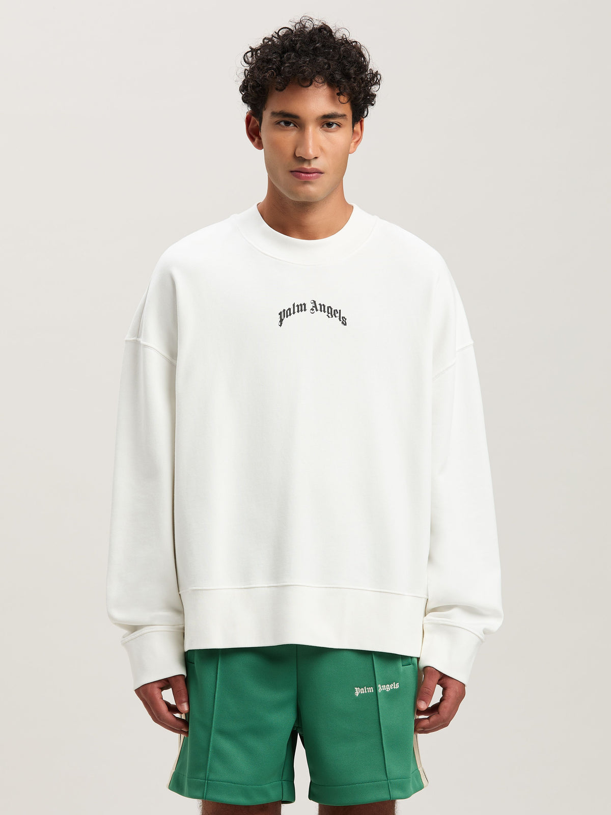 PALM ANGELS  BACK CURVED LOGO CREW OFF WHITE - BLACK PMBA080S25FLE001