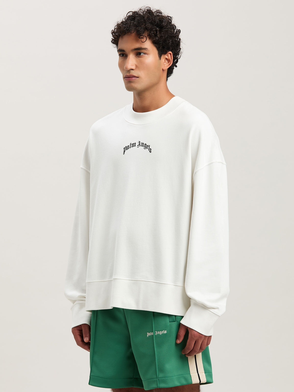 PALM ANGELS  BACK CURVED LOGO CREW OFF WHITE - BLACK PMBA080S25FLE001