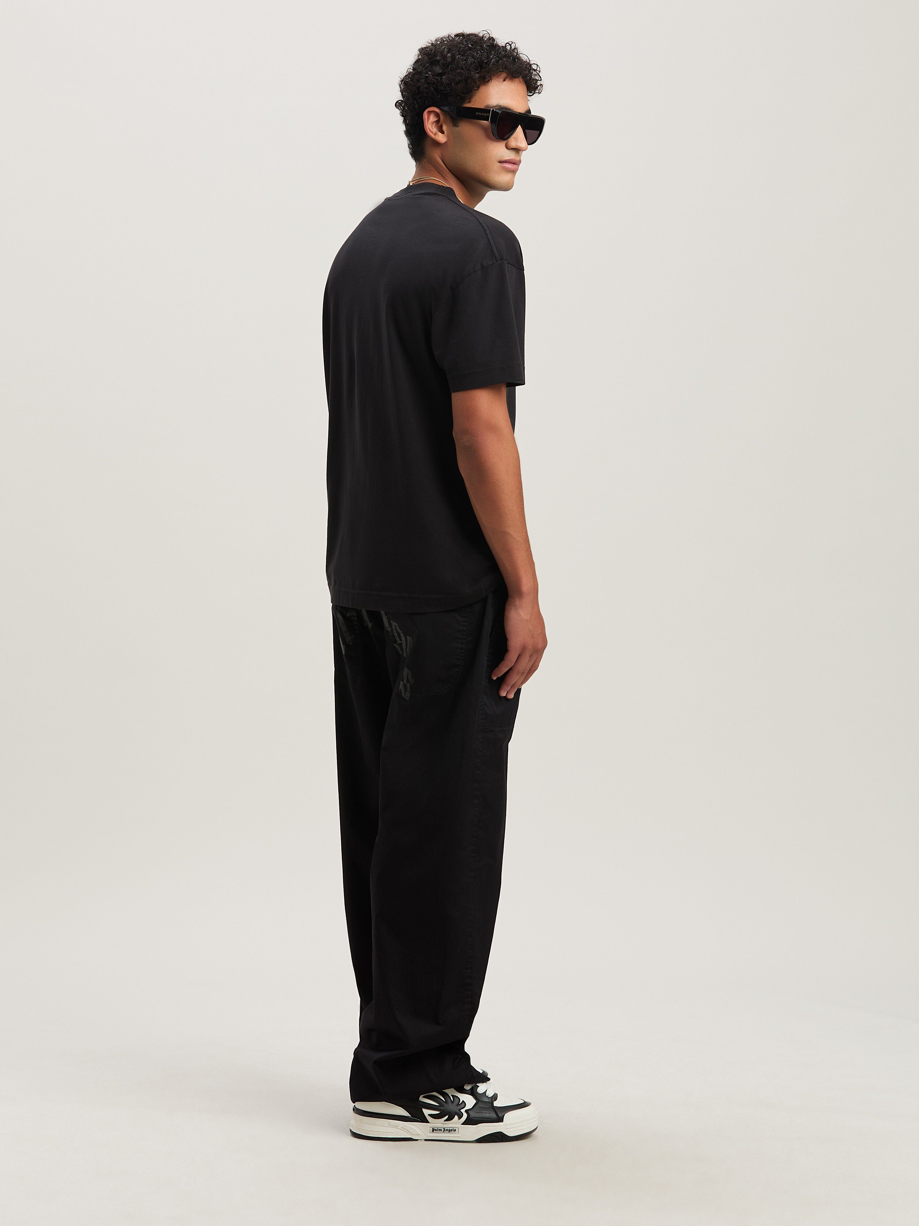 PALM ANGELS  CURVED LOGO LOOSE PANTS BLACK - BLACK PMCA117S25FAB001