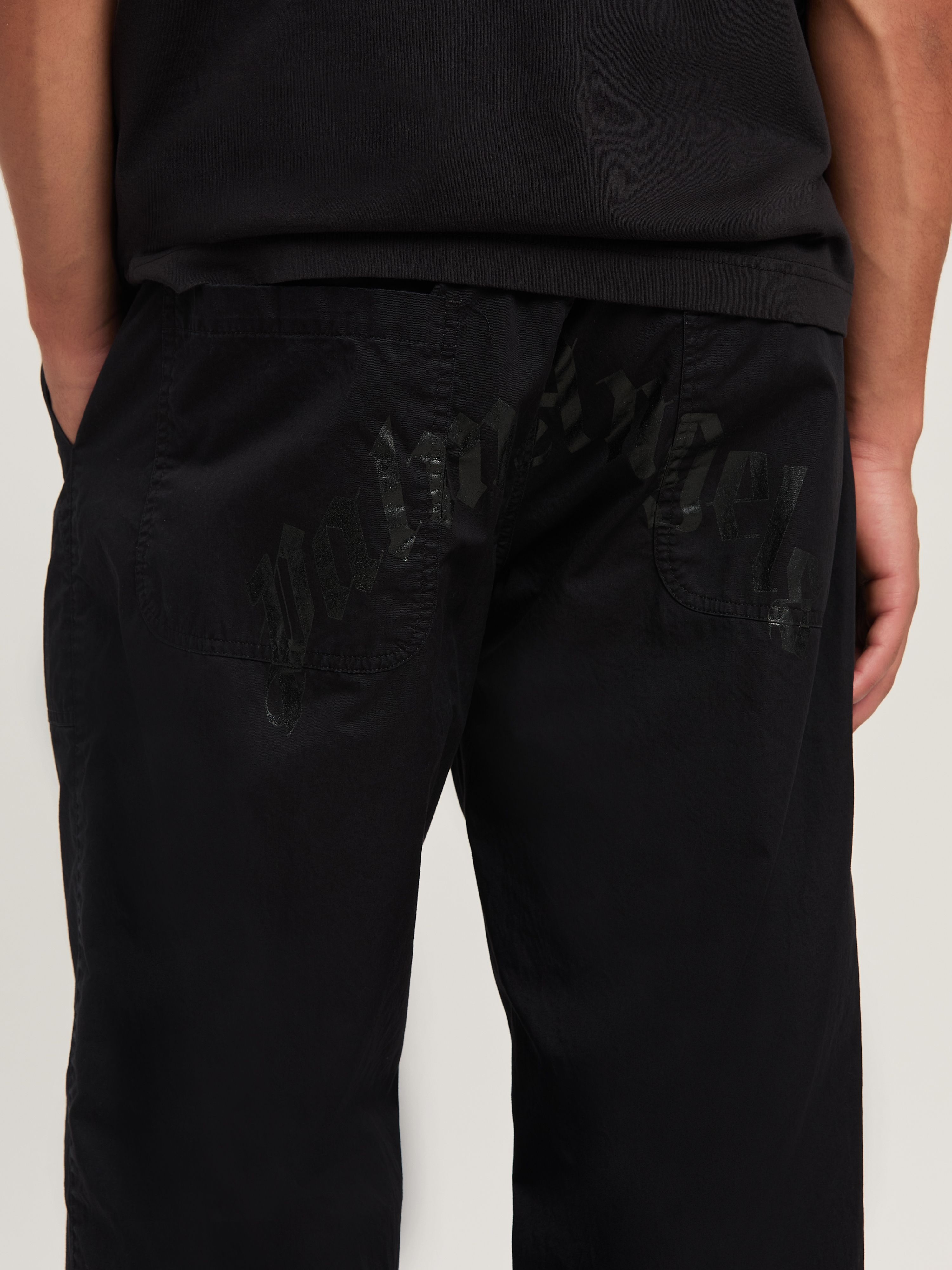 PALM ANGELS  CURVED LOGO LOOSE PANTS BLACK - BLACK PMCA117S25FAB001