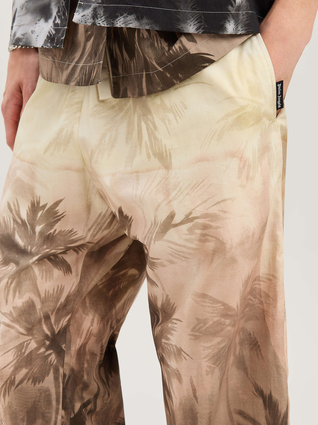 PALM ANGELS  SUNSET PALMS COZY PANTS BEIGE - BLACK PMCA143S25FAB003