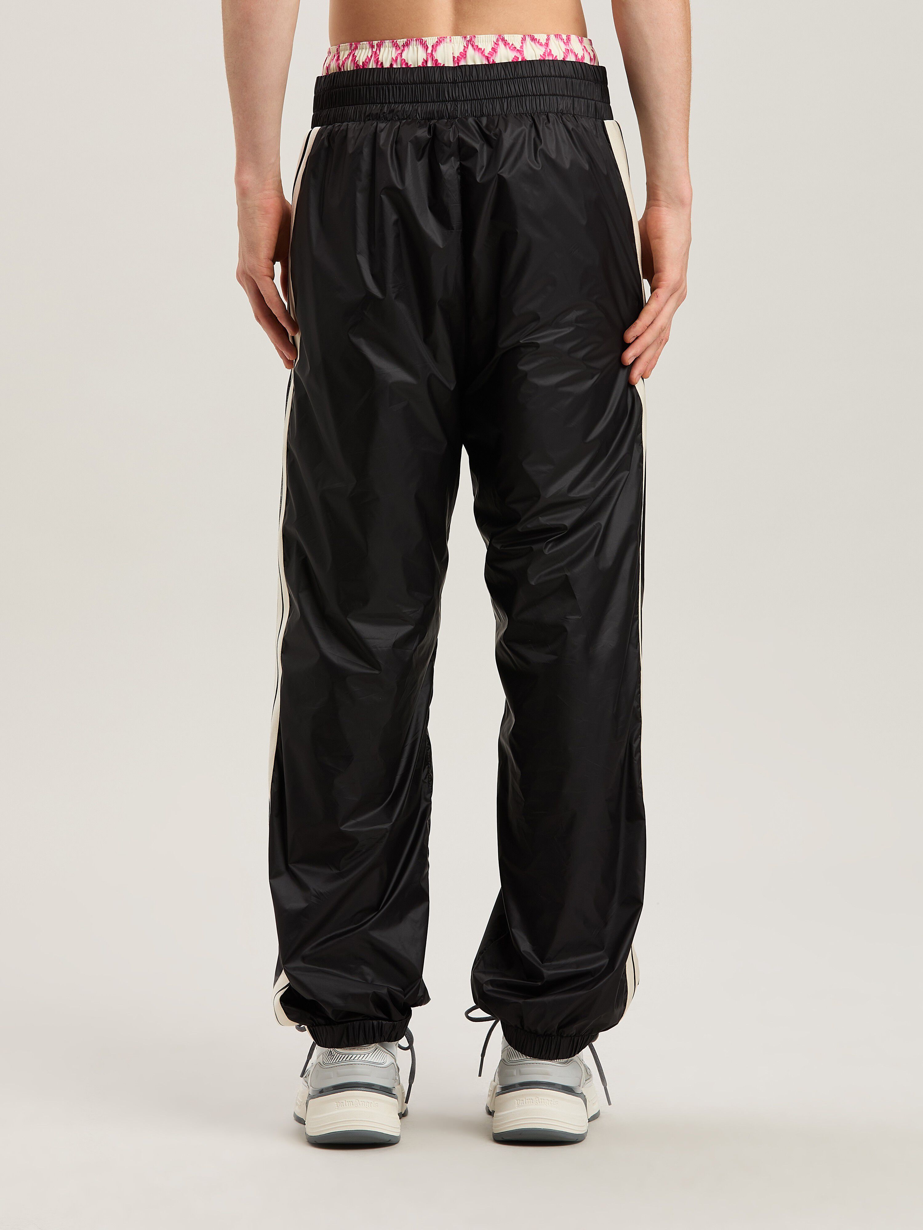 PALM ANGELS  CURVED LOGO NYLON TRACK PANTS BLACK - GR BLACK - GREY PMCA179S25FAB001