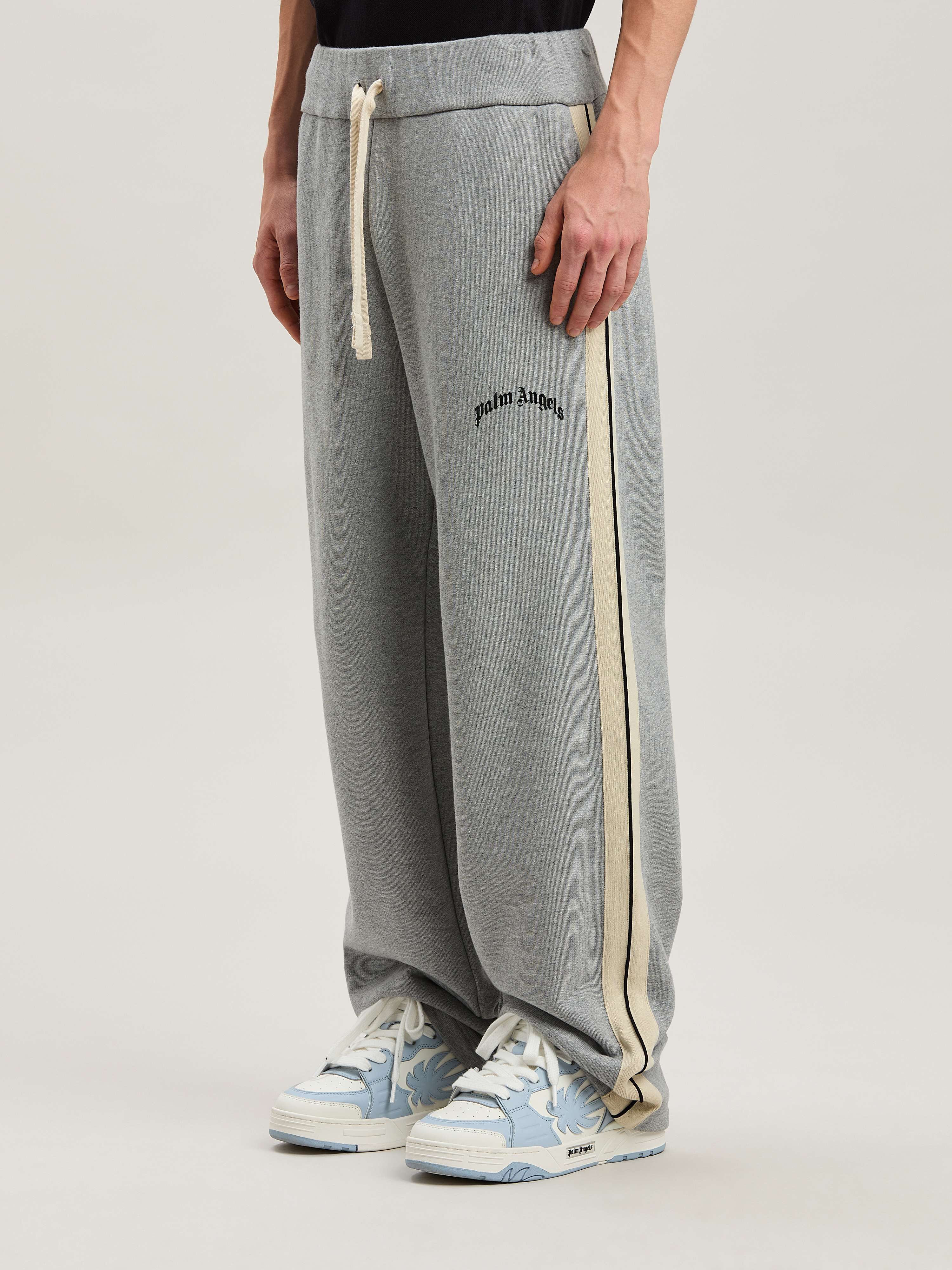 PALM ANGELS  CURVED LOGO TRACK SWEATPANTS GREY MELANG GREY MELANGE - BLACK PMCH02BS25FLE001