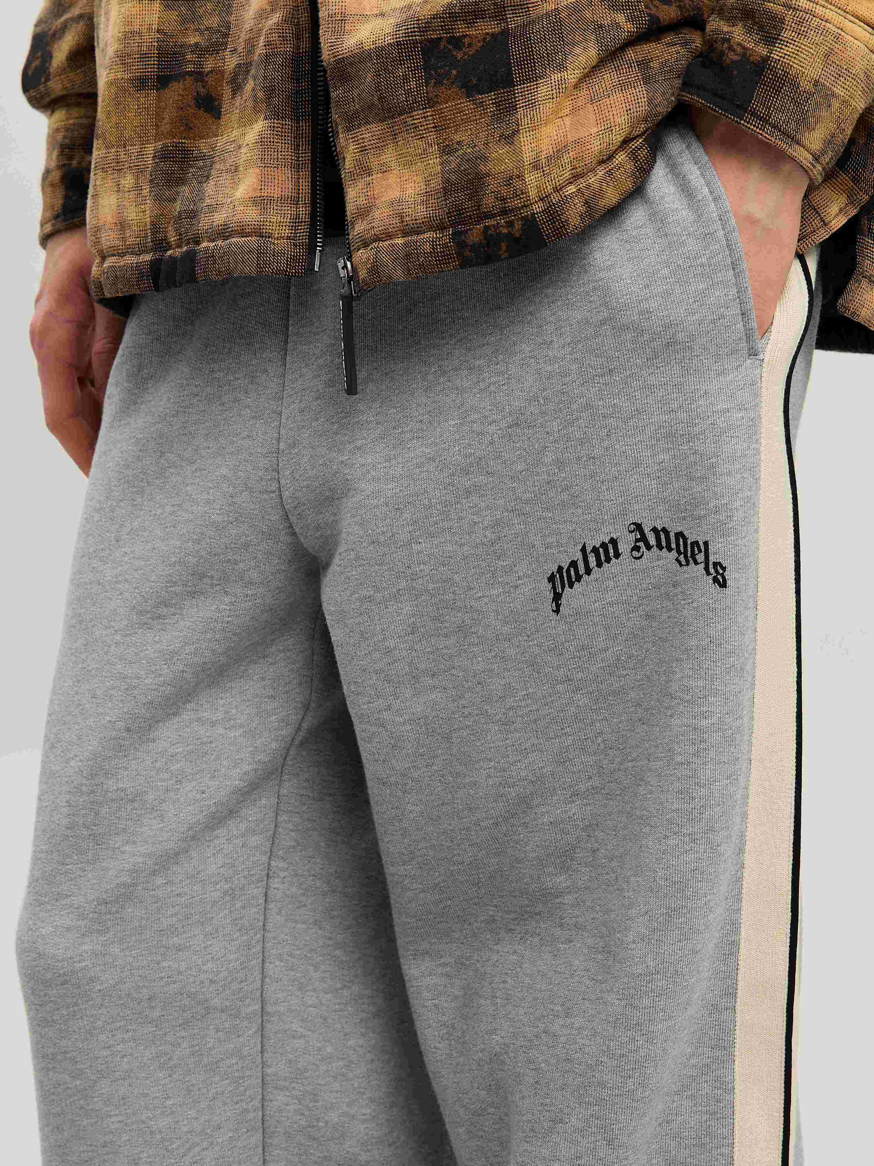 PALM ANGELS  CURVED LOGO TRACK SWEATPANTS GREY MELANG GREY MELANGE - BLACK PMCH02BS25FLE001