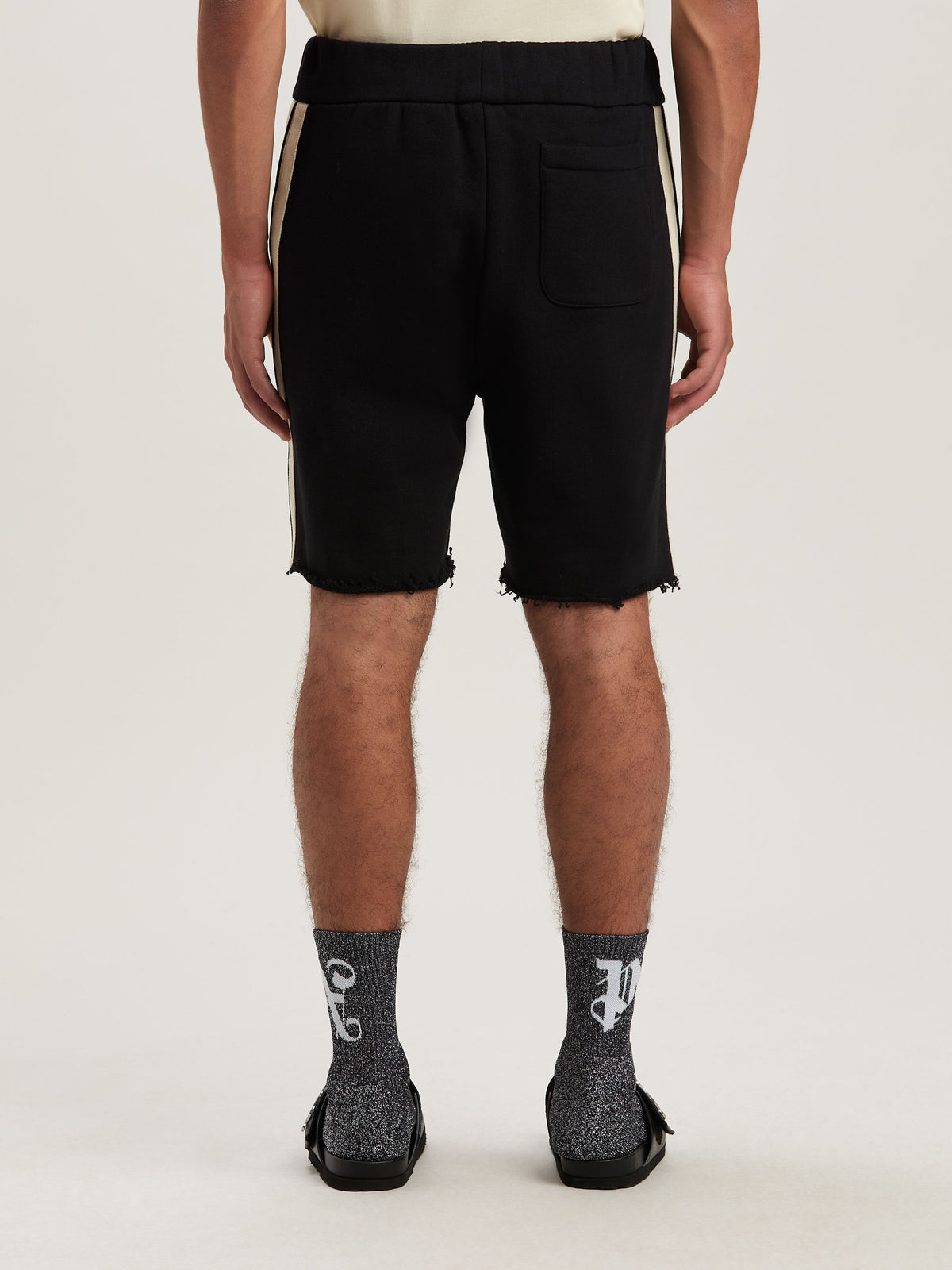 PALM ANGELS  CURVED LOGO TRACK SWEATSHORTS BLACK - IV BLACK - IVORY PMCI026S25FLE001