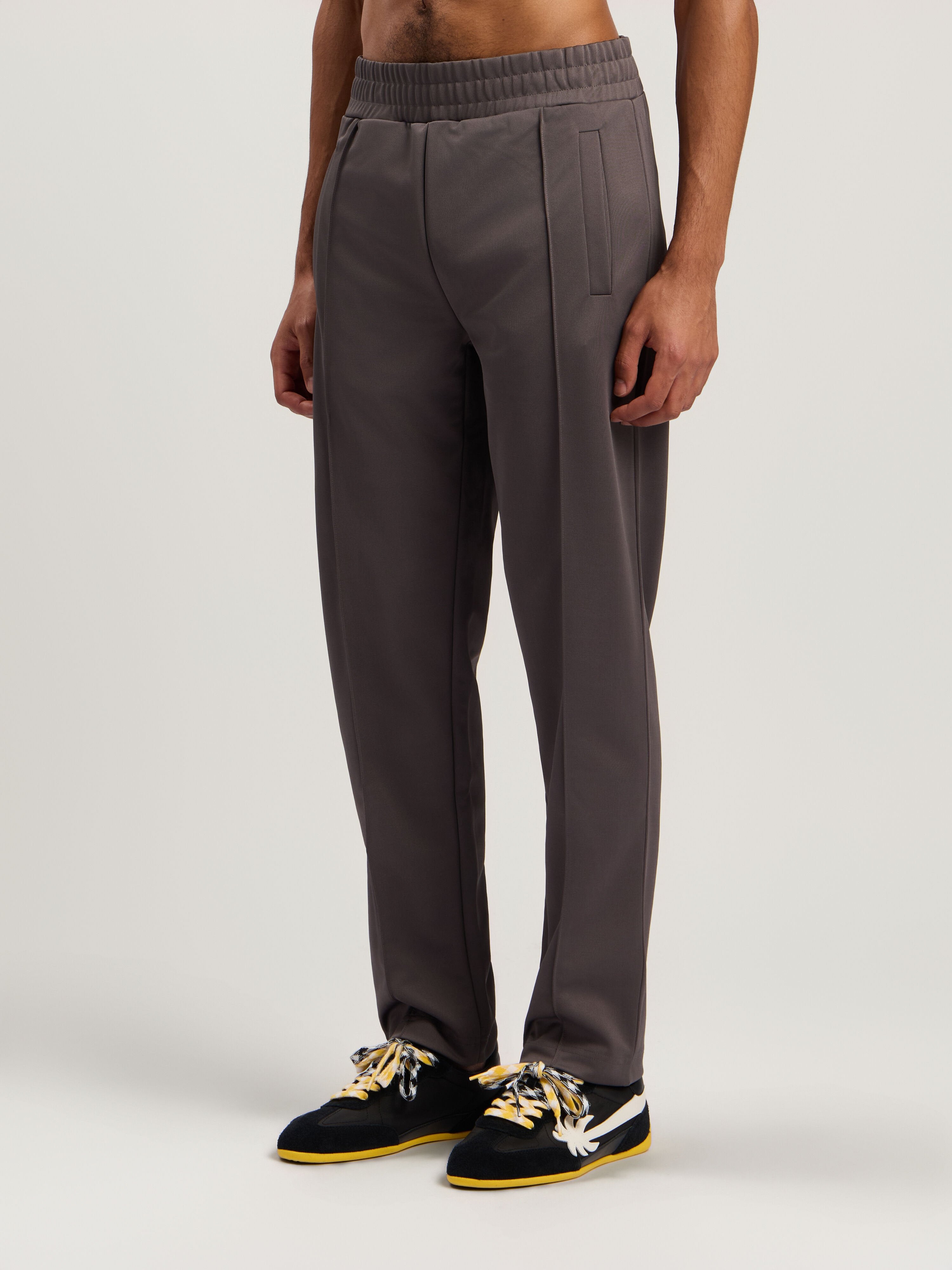 PALM ANGELS Curved Logo Track Pants DARK GREY - OFF WHITE PMCJ048F25FAB001