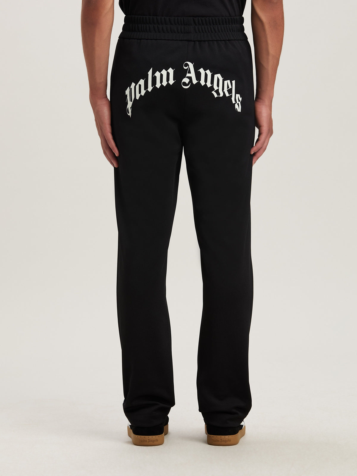 PALM ANGELS  BACK CURVED LOGO TRACK PANTS BLACK - OFF BLACK - OFF WHITE PMCJ048S25FAB001