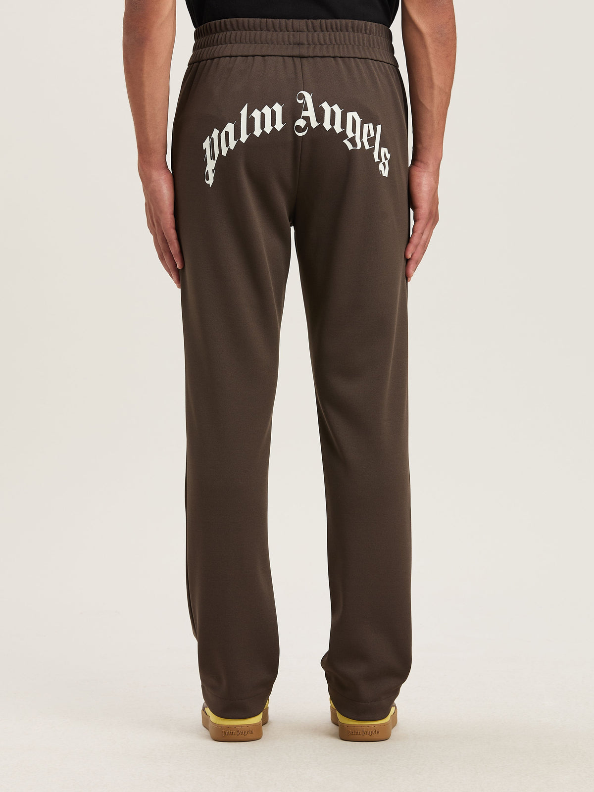PALM ANGELS  BACK CURVED LOGO TRACK PANTS VINTAGE BLA VINTAGE BLACK - OFF WHITE PMCJ048S25FAB001