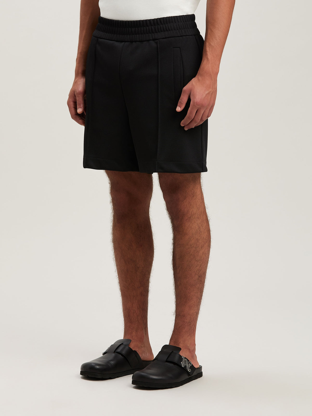 PALM ANGELS  BACK CURVED LOGO TRACK SHORTS BLACK - OF BLACK - OFF WHITE PMCL008S25FAB001