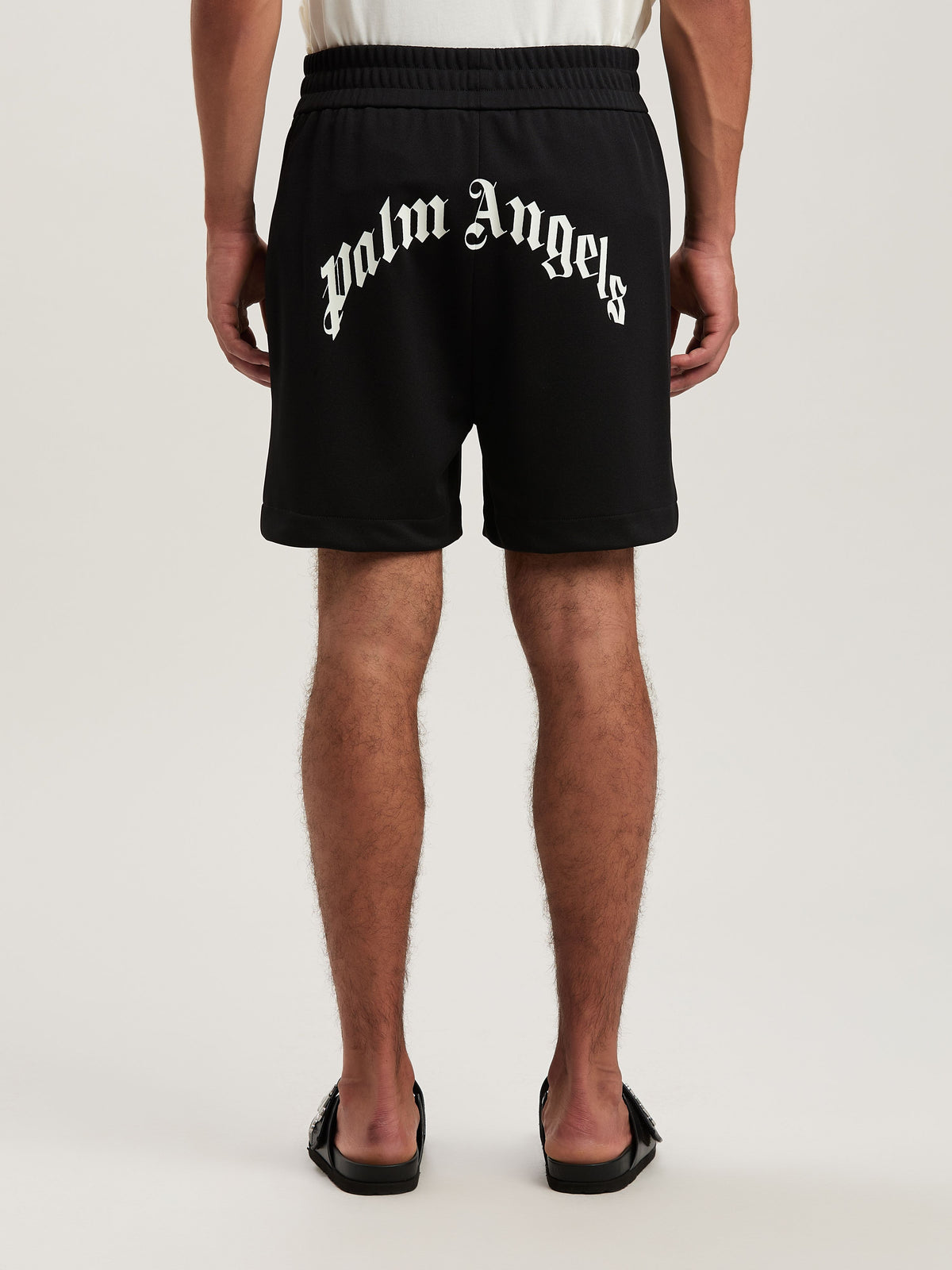 PALM ANGELS  BACK CURVED LOGO TRACK SHORTS BLACK - OF BLACK - OFF WHITE PMCL008S25FAB001