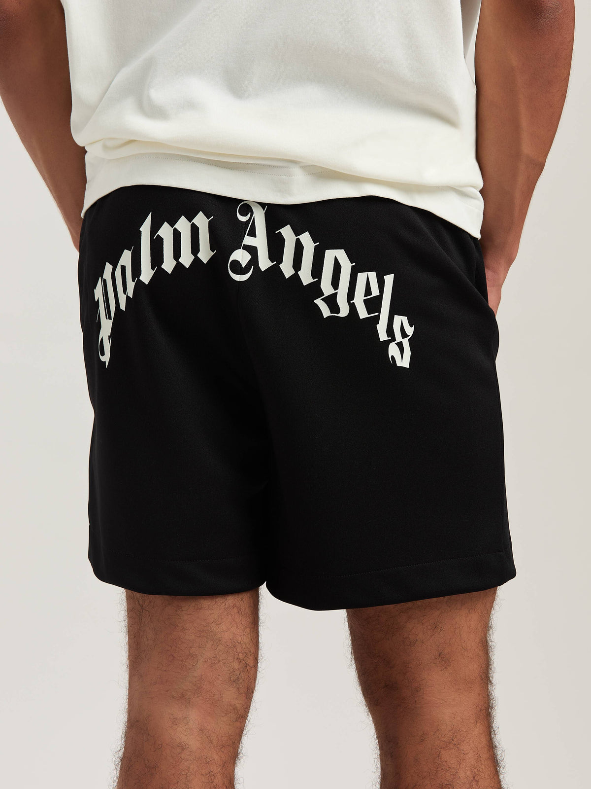 PALM ANGELS  BACK CURVED LOGO TRACK SHORTS BLACK - OF BLACK - OFF WHITE PMCL008S25FAB001
