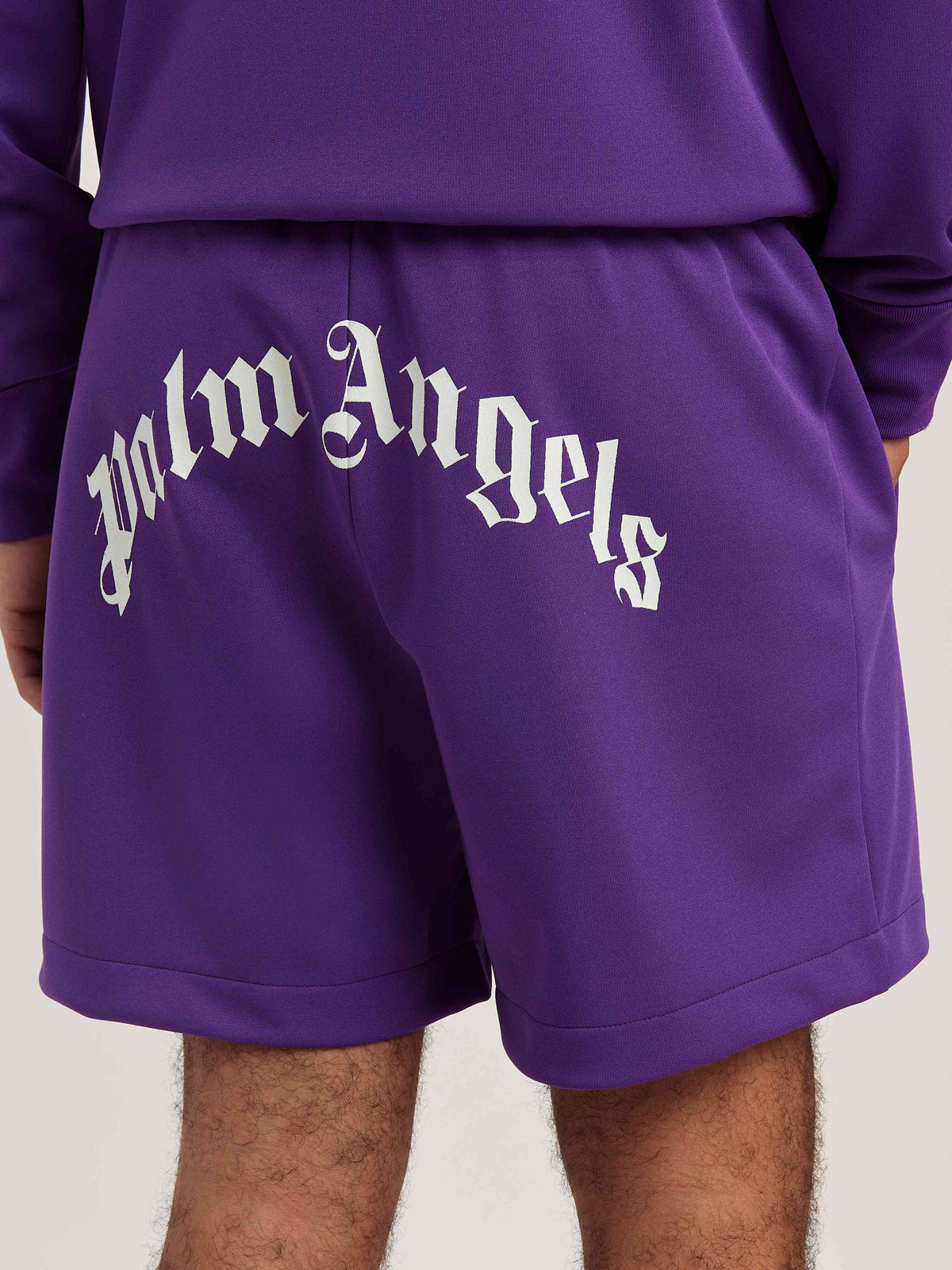 PALM ANGELS  BACK CURVED LOGO TRACK SHORTS PURPLE - O PURPLE - OFF WHITE PMCL008S25FAB001