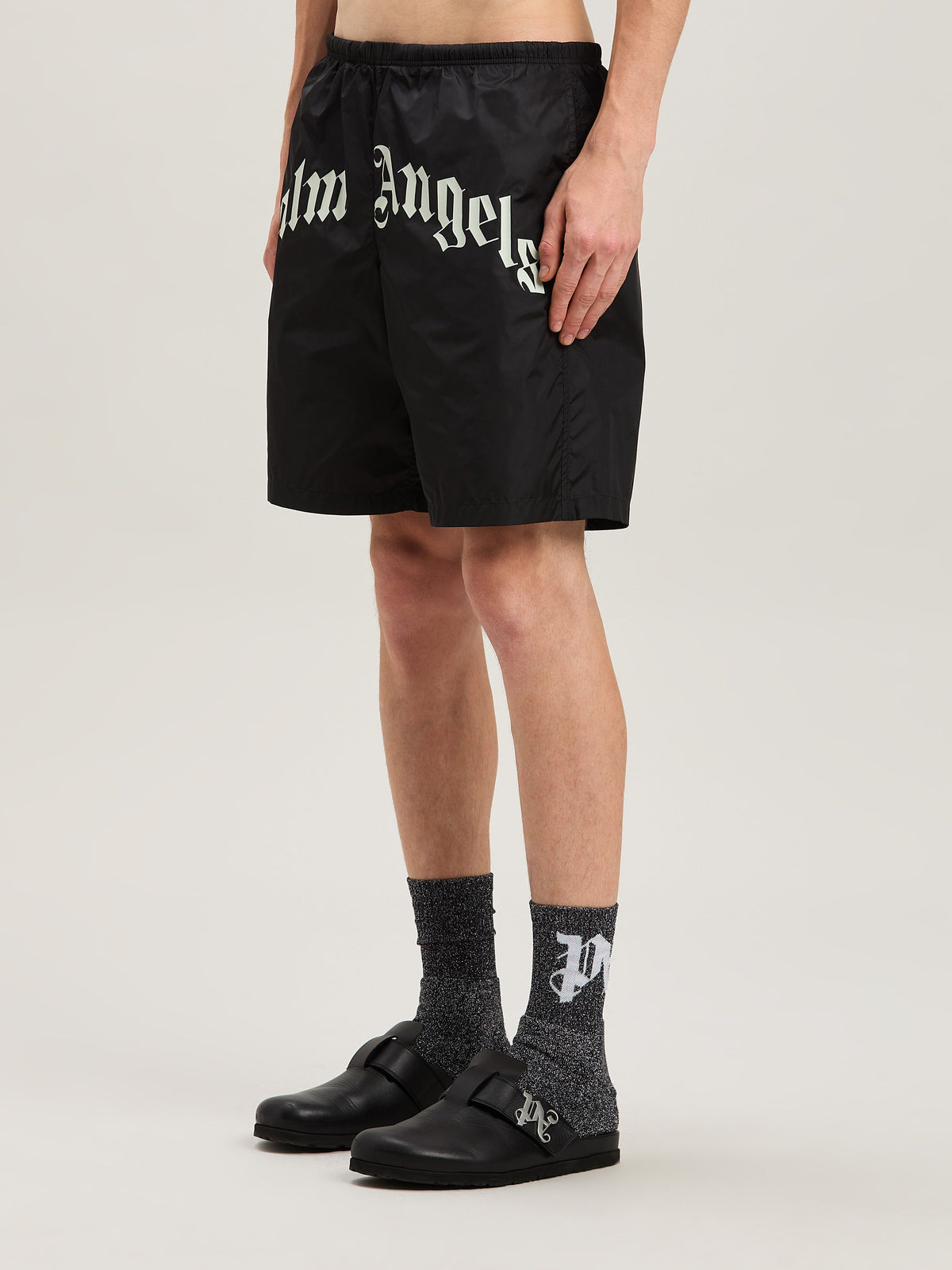 PALM ANGELS  CURVED LOGO SWIMSHORTS BLACK - OFF WHITE PMFD018S25FAB001