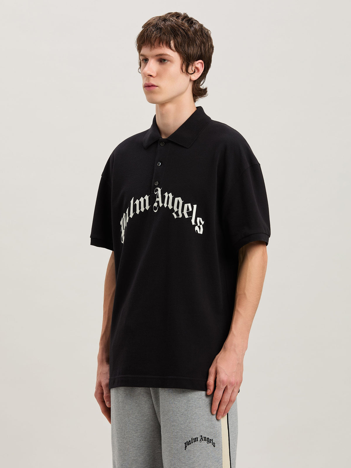 PALM ANGELS  CURVED LOGO POLO SS BLACK - OFF WHITE PMGB012S25FAB003
