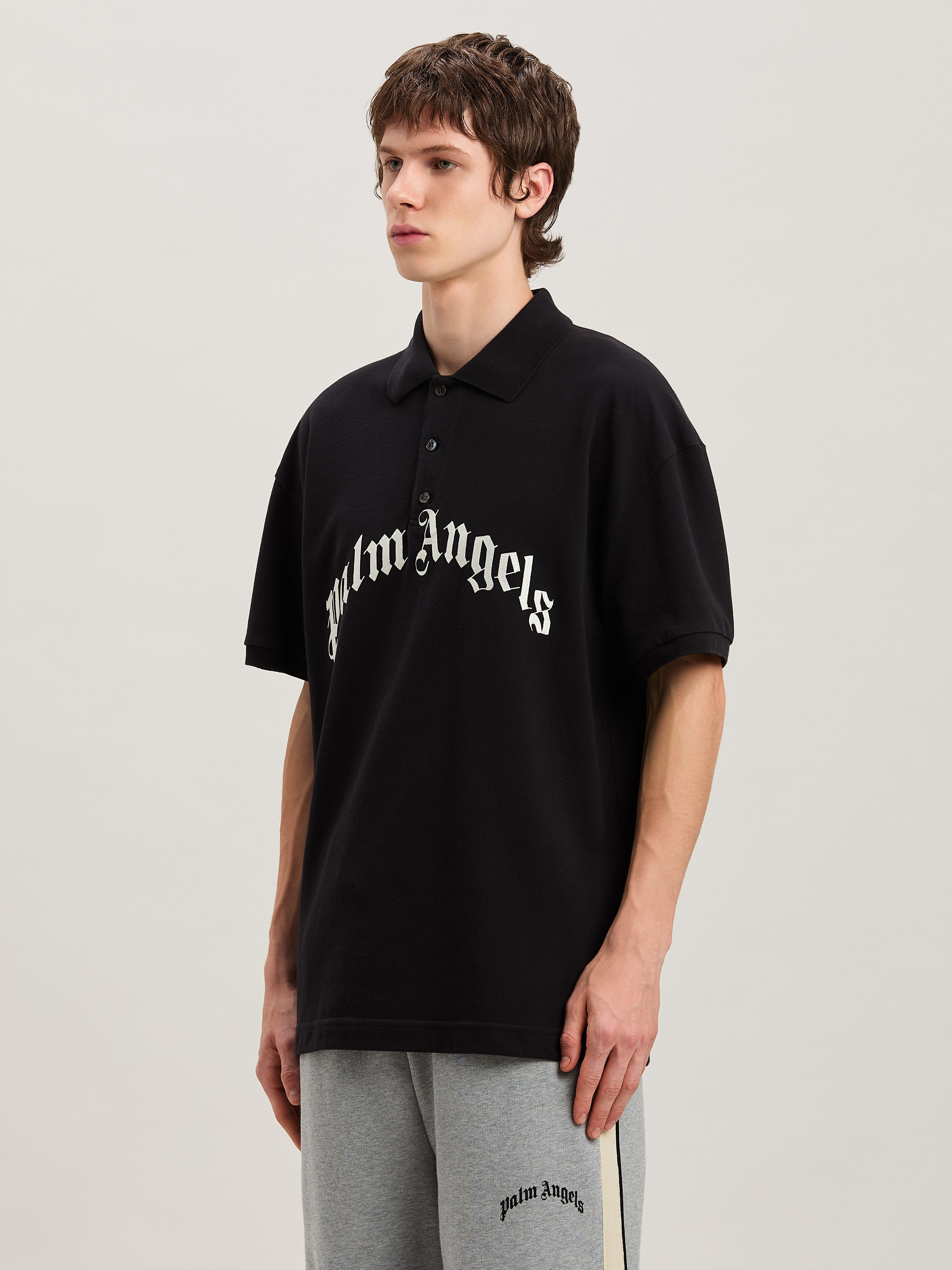 PALM ANGELS  CURVED LOGO POLO SS BLACK - OFF WHITE PMGB012S25FAB003