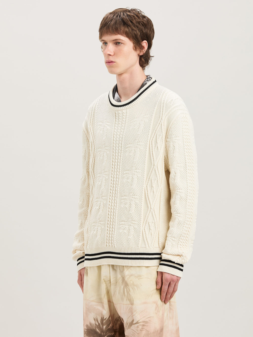 PALM ANGELS  CURVED LOGO CABLE SWEATER OFF WHITE - BL OFF WHITE - BLACK PMHE058S25KNI002