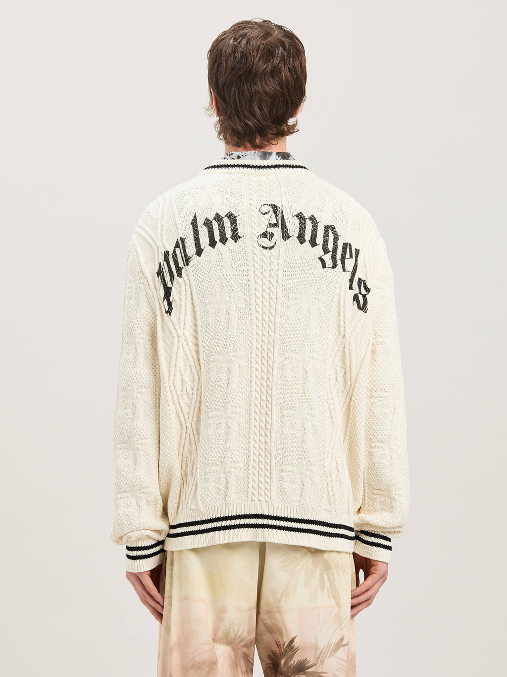 PALM ANGELS  CURVED LOGO CABLE SWEATER OFF WHITE - BL OFF WHITE - BLACK PMHE058S25KNI002