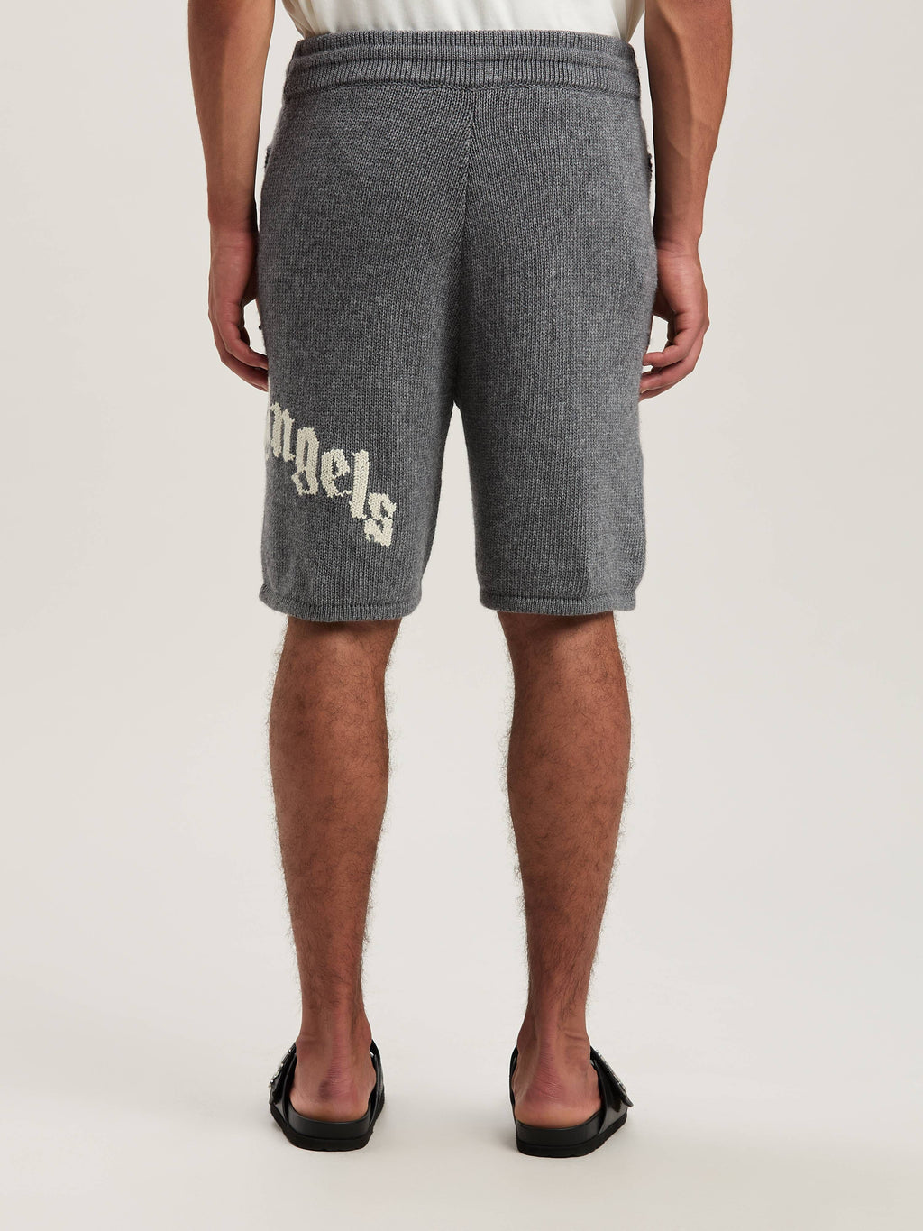PALM ANGELS  CURVED LOGO KNIT SHORTS GREY MELANGE - O GREY MELANGE - OFF WHITE PMHM011S25KNI001