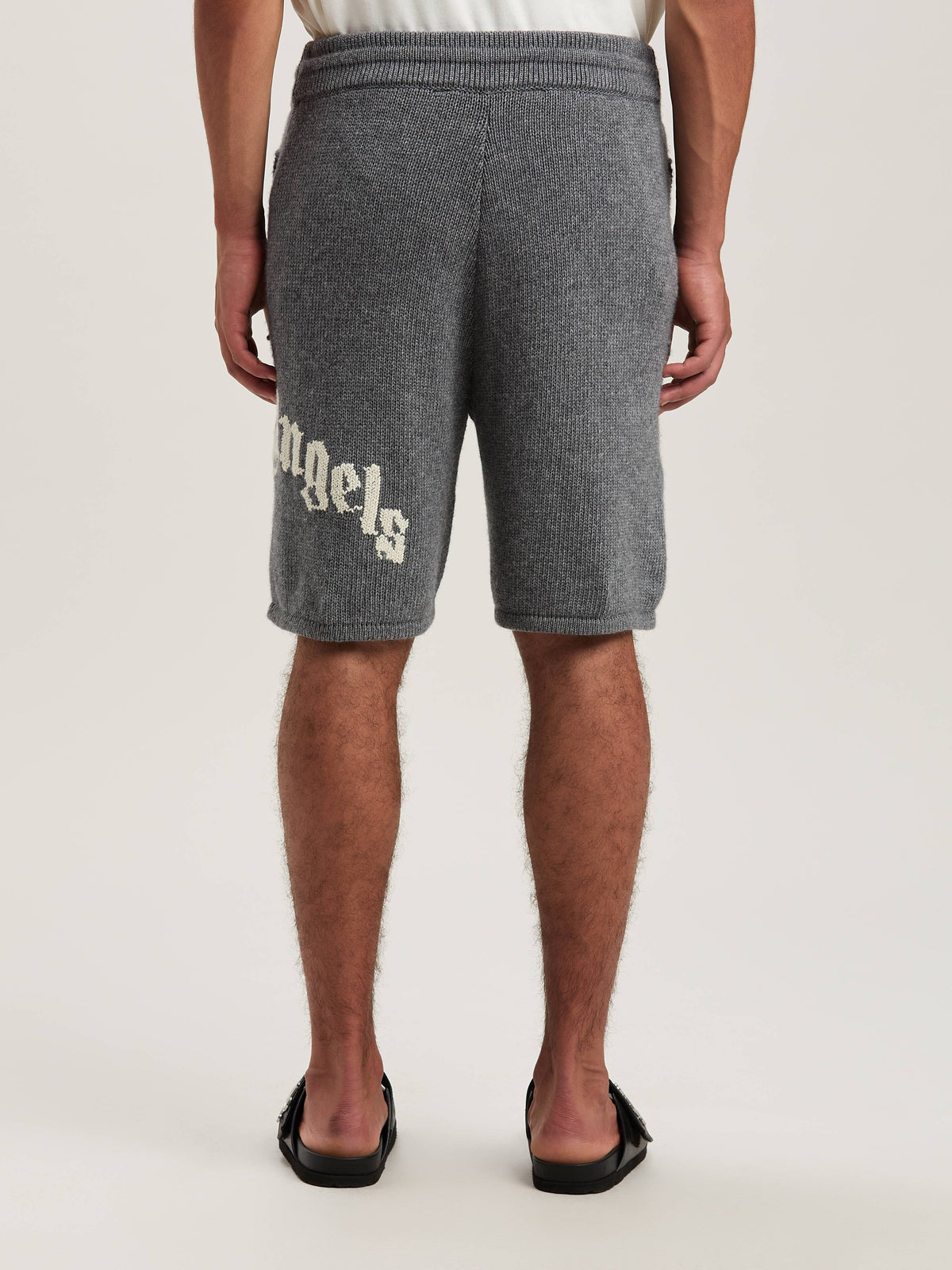 PALM ANGELS  CURVED LOGO KNIT SHORTS GREY MELANGE - O GREY MELANGE - OFF WHITE PMHM011S25KNI001