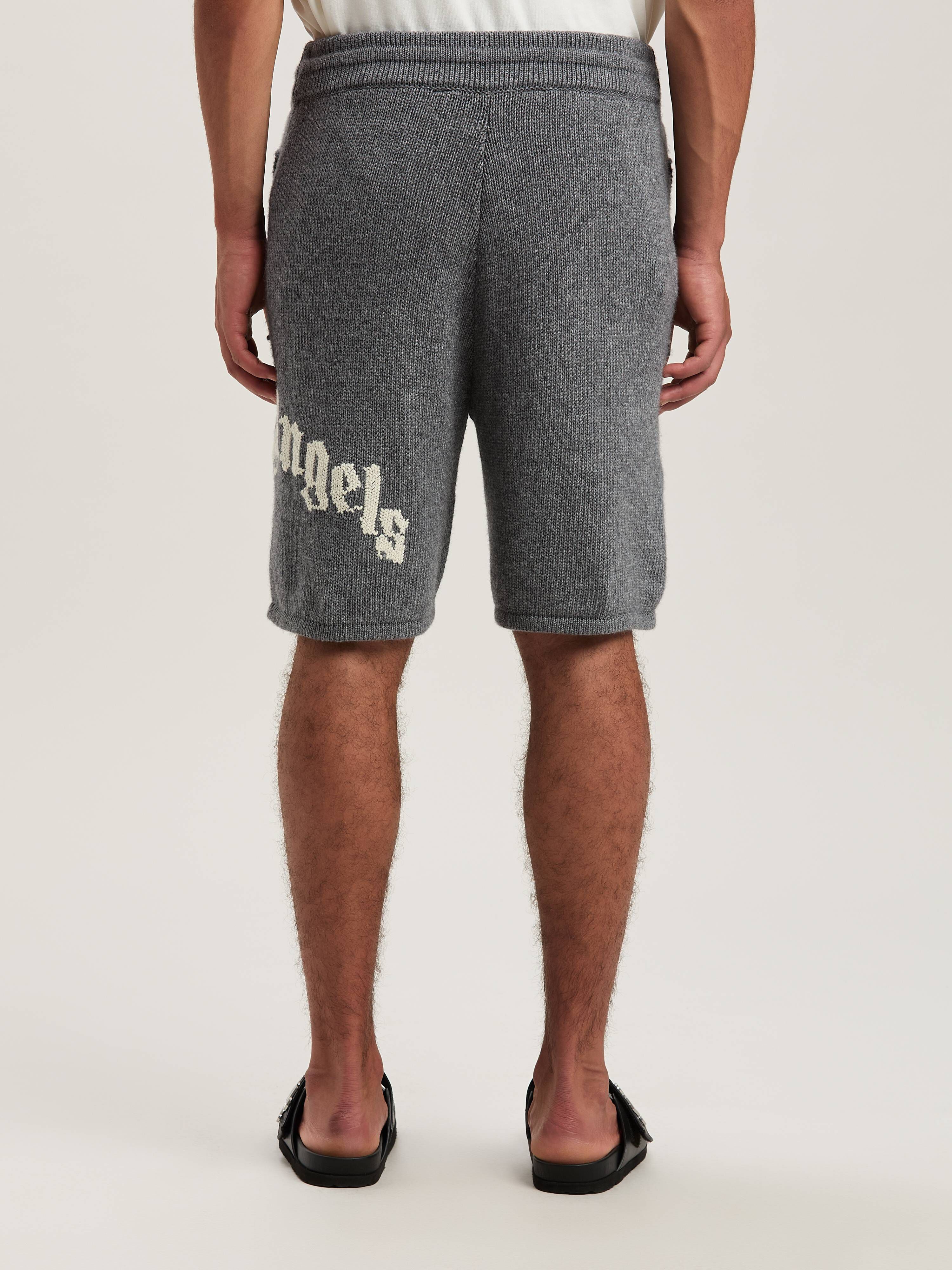 PALM ANGELS  CURVED LOGO KNIT SHORTS GREY MELANGE - O GREY MELANGE - OFF WHITE PMHM011S25KNI001