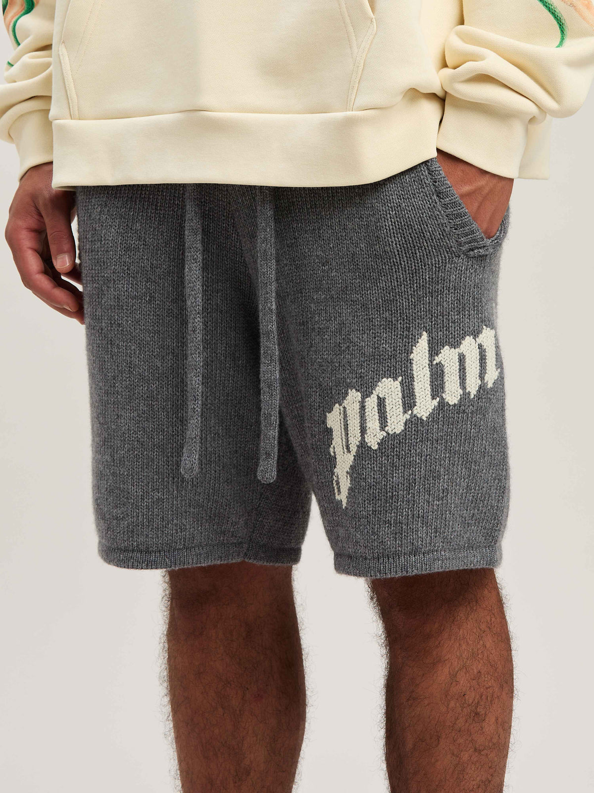 PALM ANGELS  CURVED LOGO KNIT SHORTS GREY MELANGE - O GREY MELANGE - OFF WHITE PMHM011S25KNI001