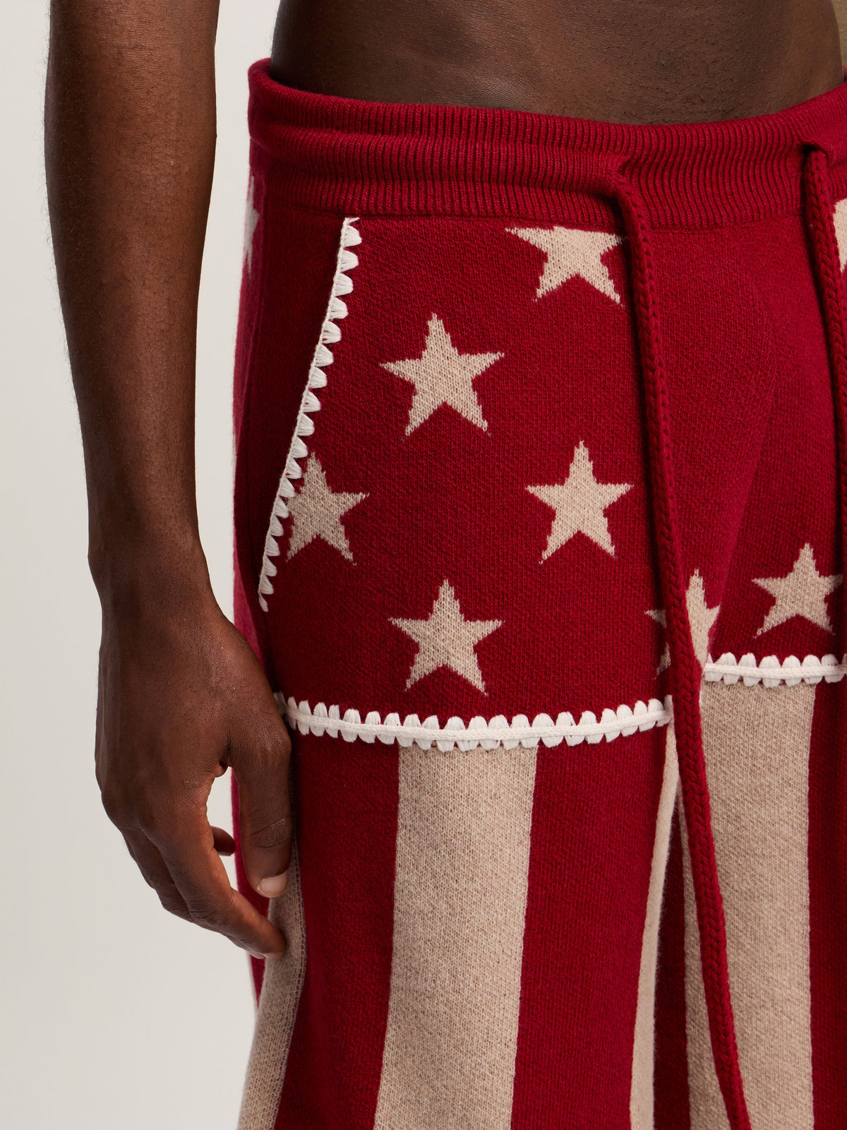 PALM ANGELS Stars and Stripes Shorts RED - ECRU PMHM015F25KNI001