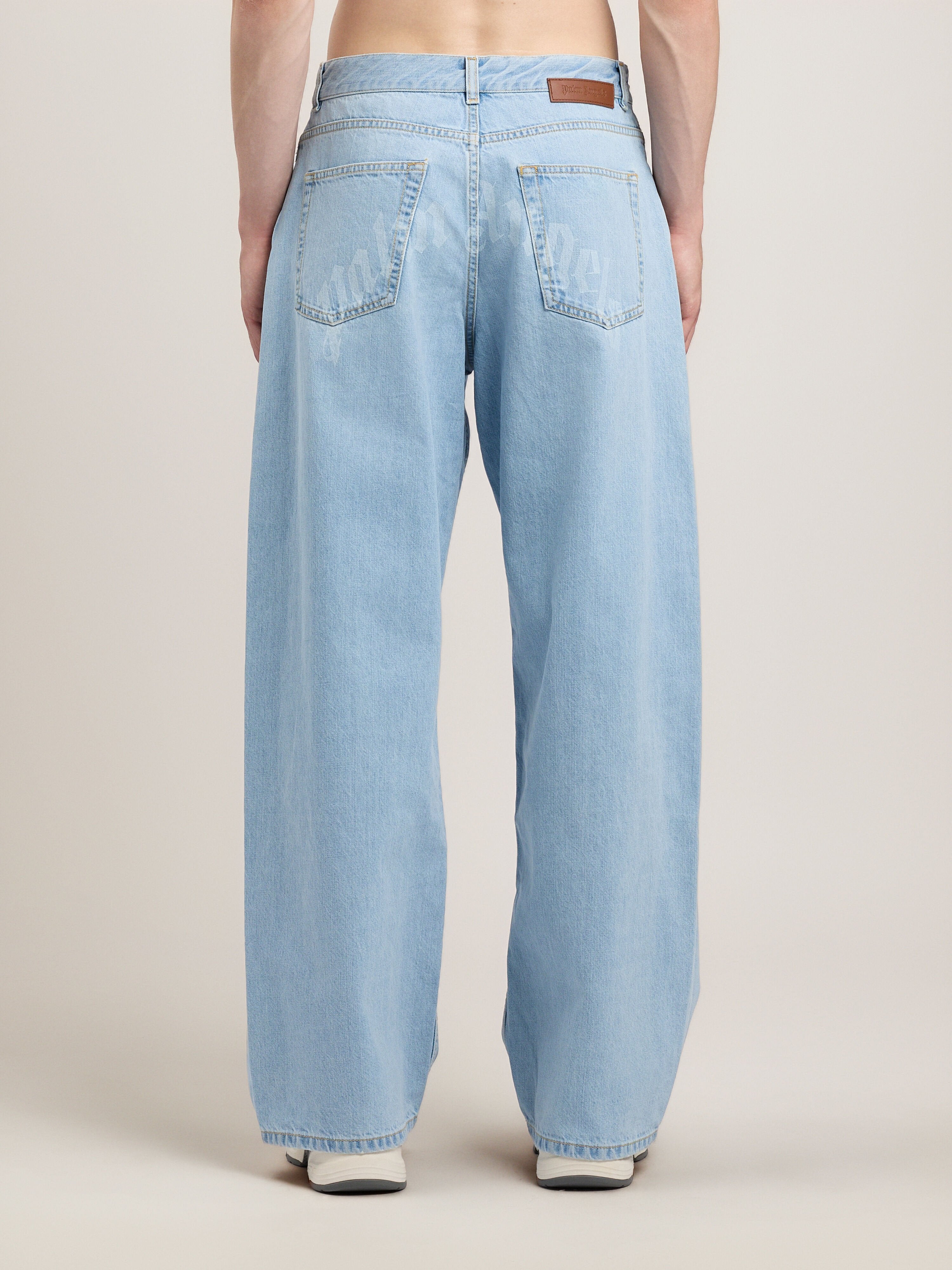 PALM ANGELS Curved Logo Loose Jeans LIGHT BLUE LIGHT BLUE PMYA049S26DEN009