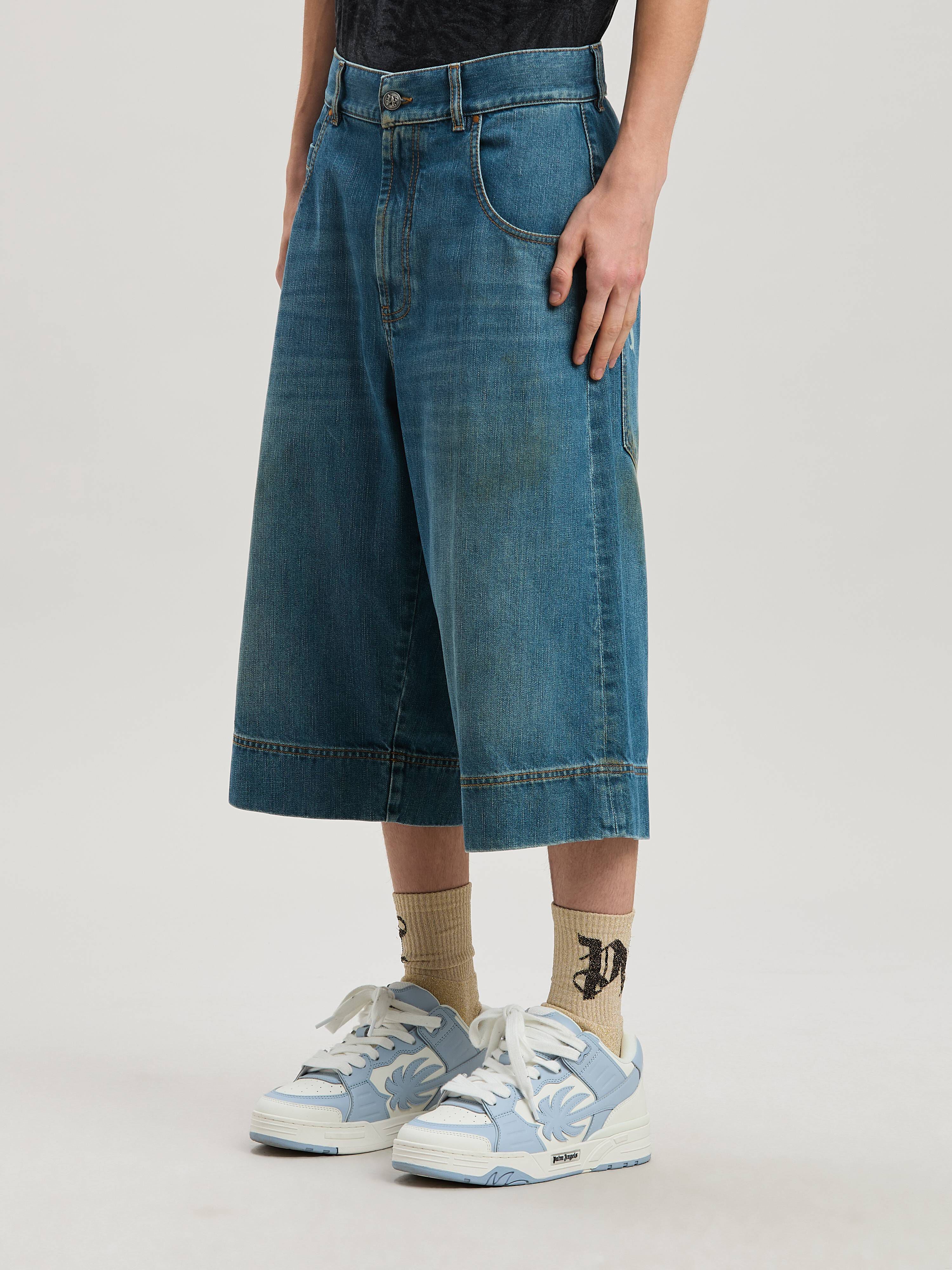 PALM ANGELS  G CURVED LOGO DENIM SKATER BLUE - GREEN PMYC007S25DEN001